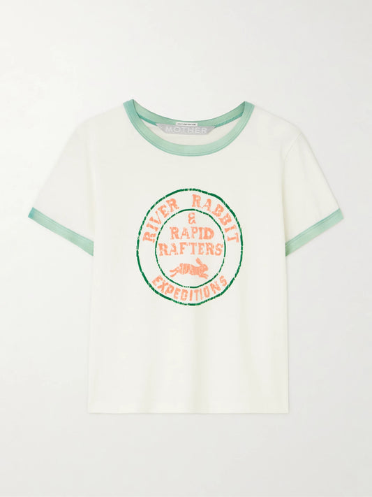 Image of a model wearing Tops. Product name - Itty Bitty Cropped Flocked Cotton-jersey T-shirt in White colour by brand - Mother