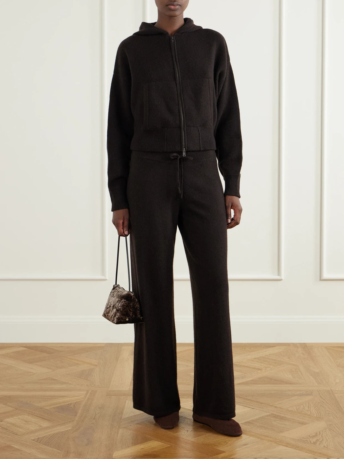 Image of a model wearing Outerwear. Product name - Lilia Cropped Cashmere Hoodie in Brown colour by brand - LISA YANG