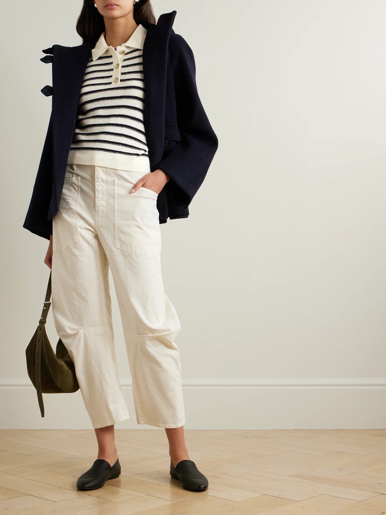 Image of a model wearing Outerwear. Product name - Striped Wool And Cashmere-blend Polo Sweater in Navy colour by brand - Allude