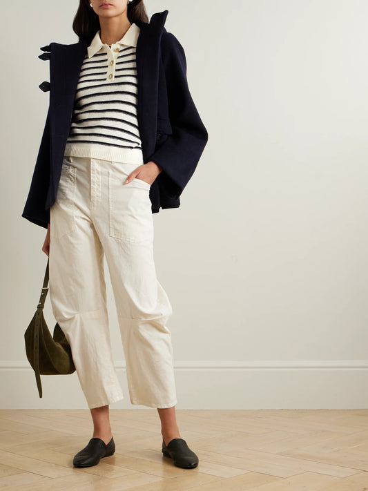 Image of a model wearing Outerwear. Product name - Striped Wool And Cashmere-blend Polo Sweater in Navy colour by brand - Allude