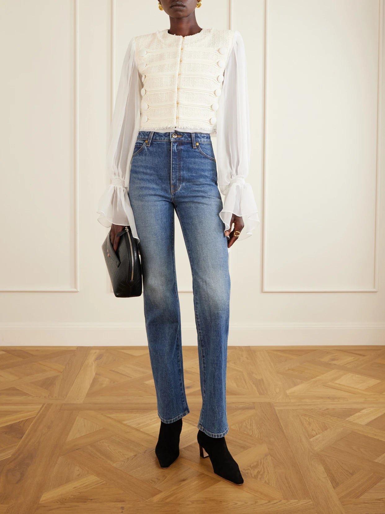 Image of a model wearing Tops. Product name - Brandebourg Tweed Blouse in White colour by brand - Balmain