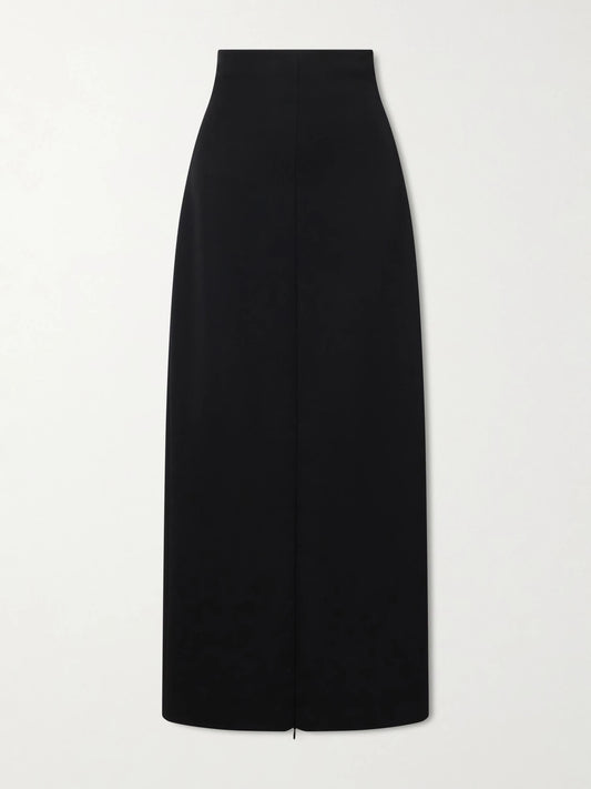 Image of a model wearing Skirts. Product name - Iphora Wool Midi Skirt in Black colour by brand - The Row