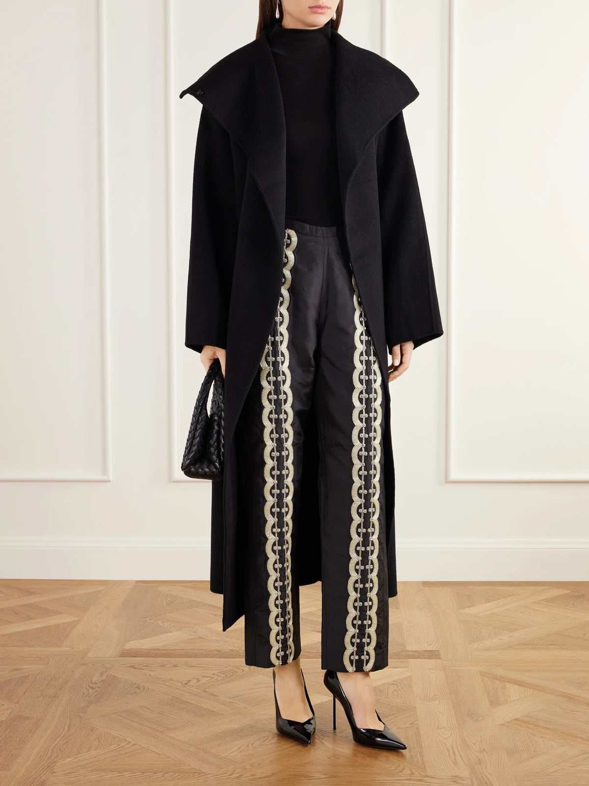 Image of a model wearing Pants. Product name - Nadja Embellished Silk Satin Straight-leg Pants in Black colour by brand - KALLMEYER