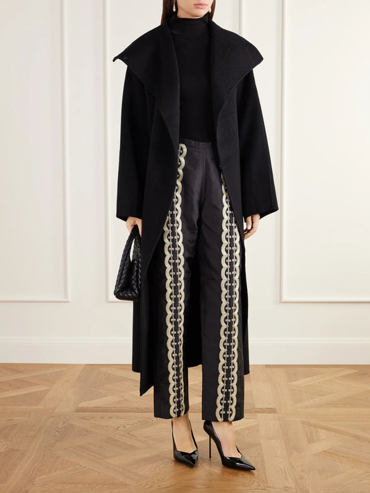 Image of a model wearing Pants. Product name - Nadja Embellished Silk Satin Straight-leg Pants in Black colour by brand - KALLMEYER