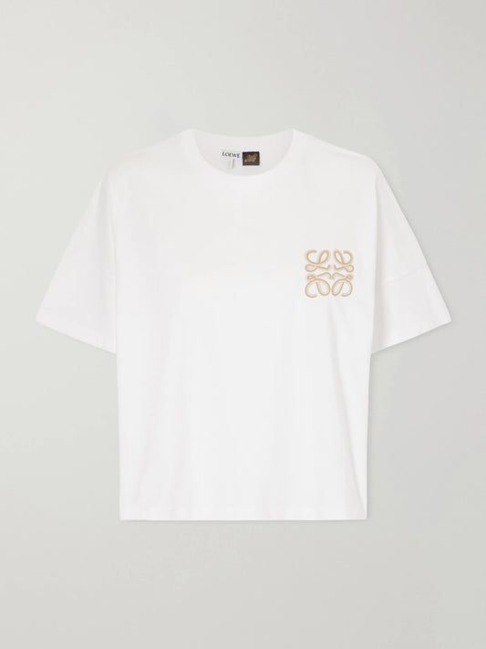 Image of a model wearing Tops. Product name - + Paula's Ibiza Logo-embroidered Cotton-jersey T-shirt in White colour by brand - LOEWE