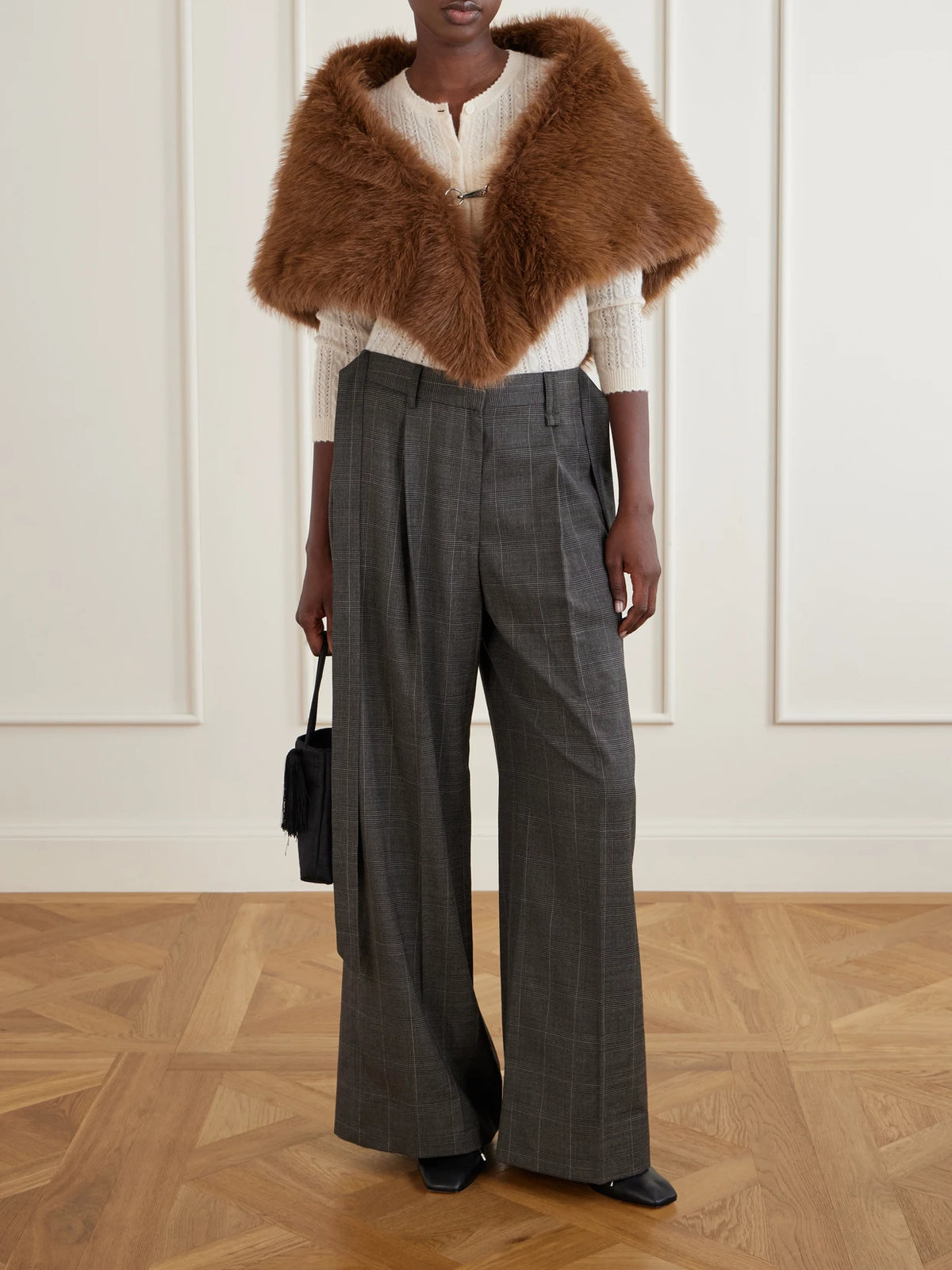 Image of a model wearing Pants. Product name - Checked Wool-blend Wide-leg Pants in Dark gray colour by brand - Simone Rocha
