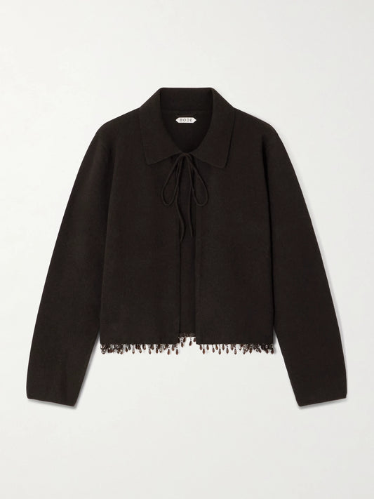 Image of a model wearing Outerwear. Product name - Embellished Wool And Cashmere-blend Cardigan in Dark brown colour by brand - BODE