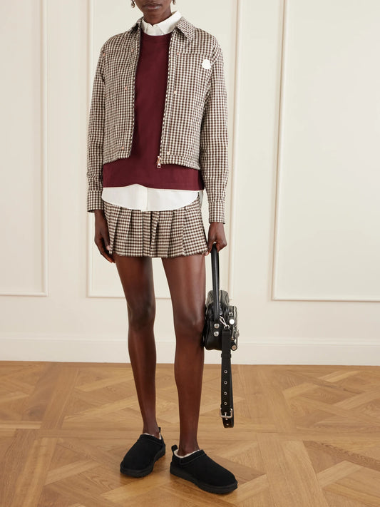 Image of a model wearing Tops. Product name - Cropped Appliquéd Gingham Cotton-blend Shirt in Brown colour by brand - Moncler