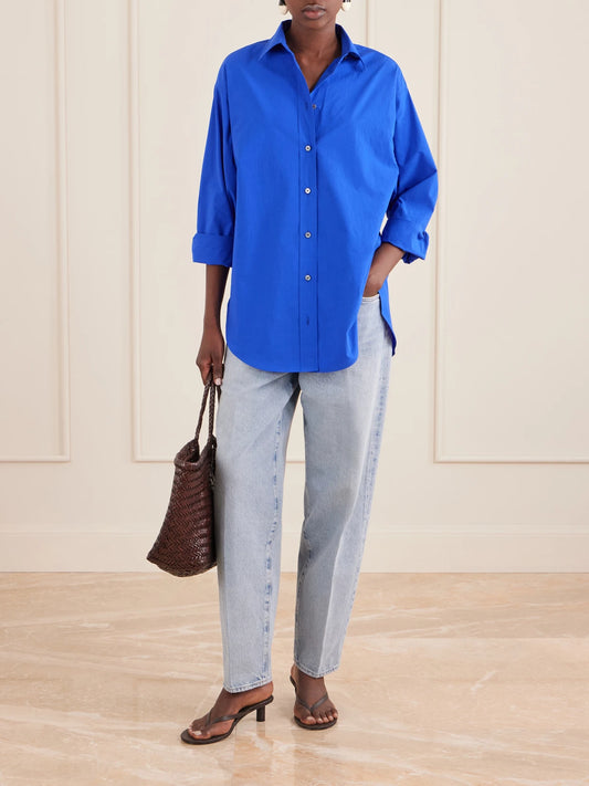 Image of a model wearing Tops. Product name - Sona Cotton-blend Shirt in Cobalt blue colour by brand - AGOLDE