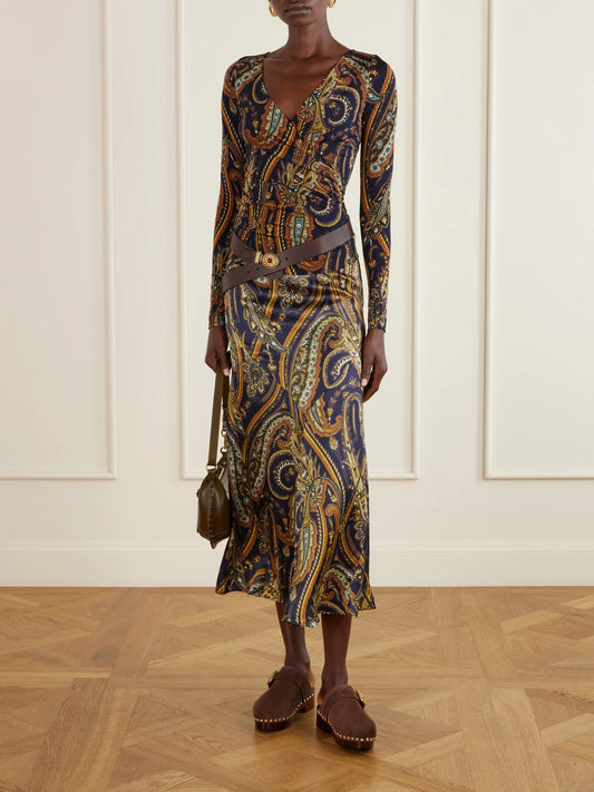 Image of a model wearing Skirts. Product name - Paisley-print Satin Midi Skirt in Navy colour by brand - Etro