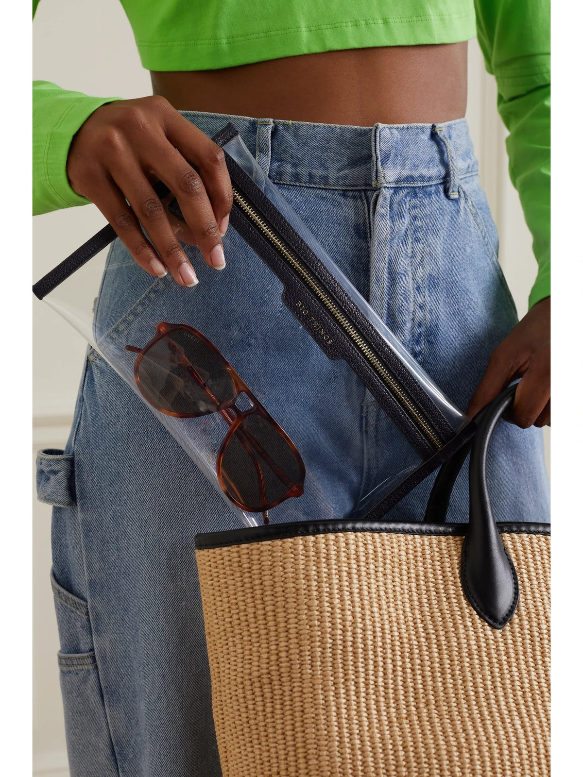 Image of Health & Beauty. Product name - Loose Pocket Big Things Leather-trimmed Tpu Clutch in Clear colour by brand - Anya Hindmarch