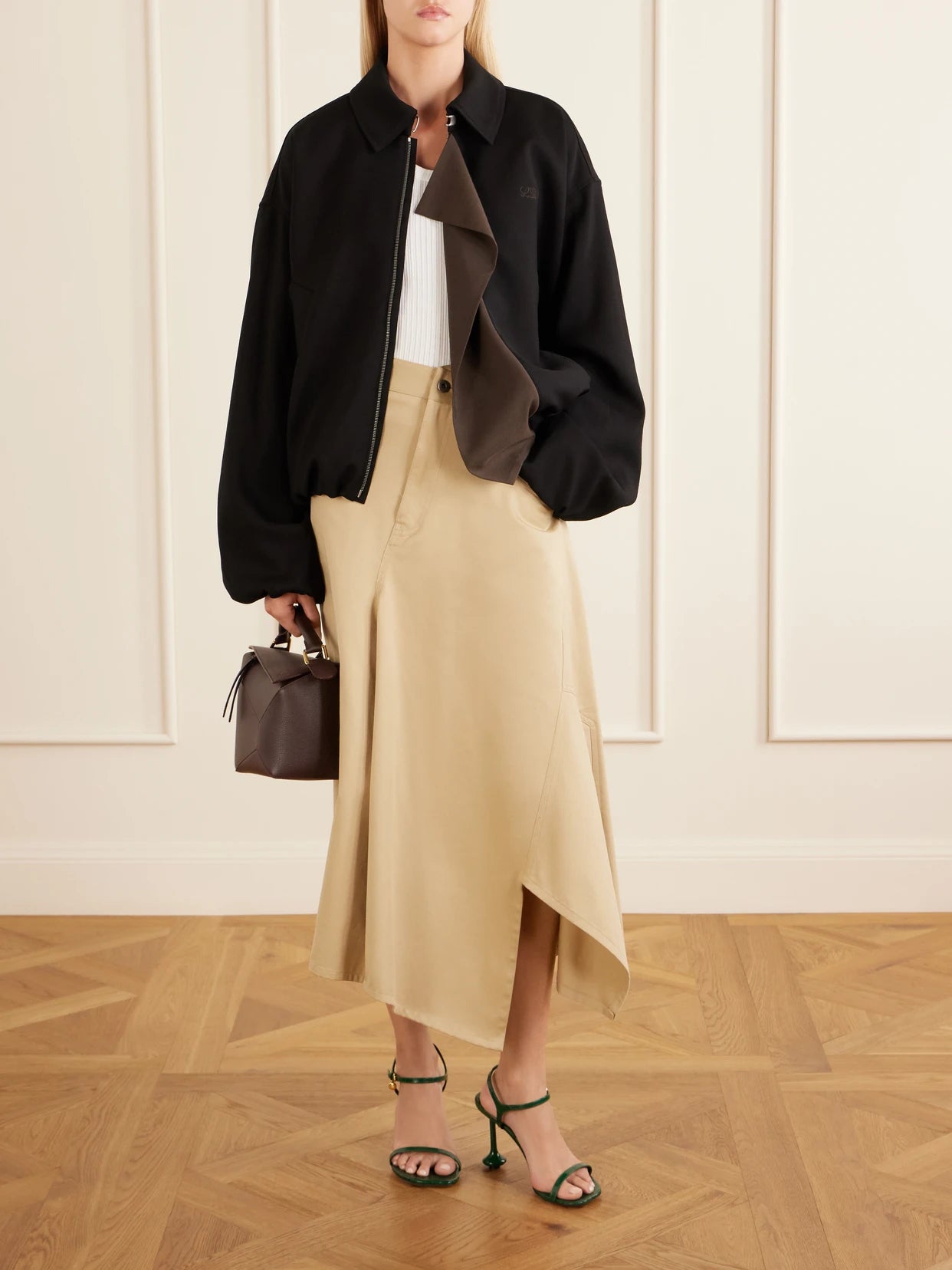 Image of a model wearing Tops. Product name - Appliquéd Ribbed Cotton-blend Tank in White colour by brand - LOEWE