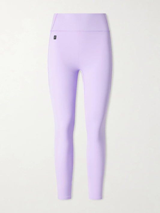 Image of a model wearing Pants. Product name - Apparel Studio Sensetec Leggings in Lilac colour by brand - ON