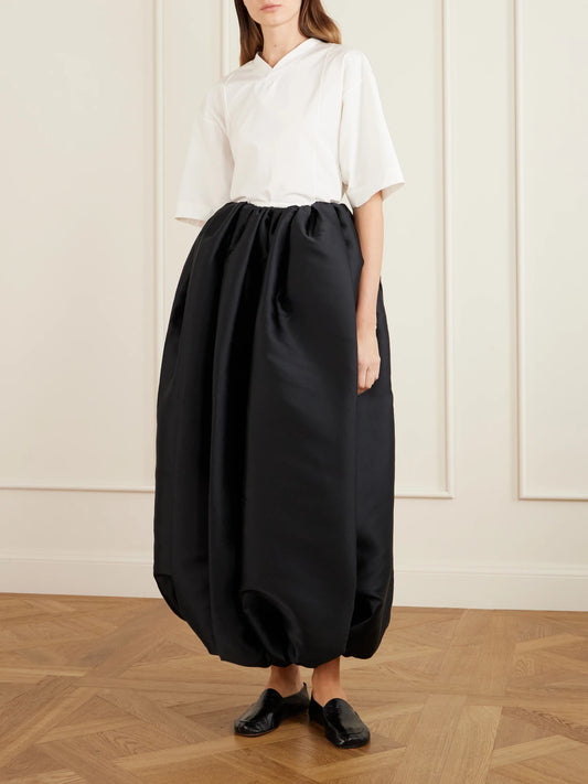 Image of a model wearing Skirts. Product name - Gathered Duchesse Satin Maxi Skirt in Black colour by brand - Calvin Klein Collection