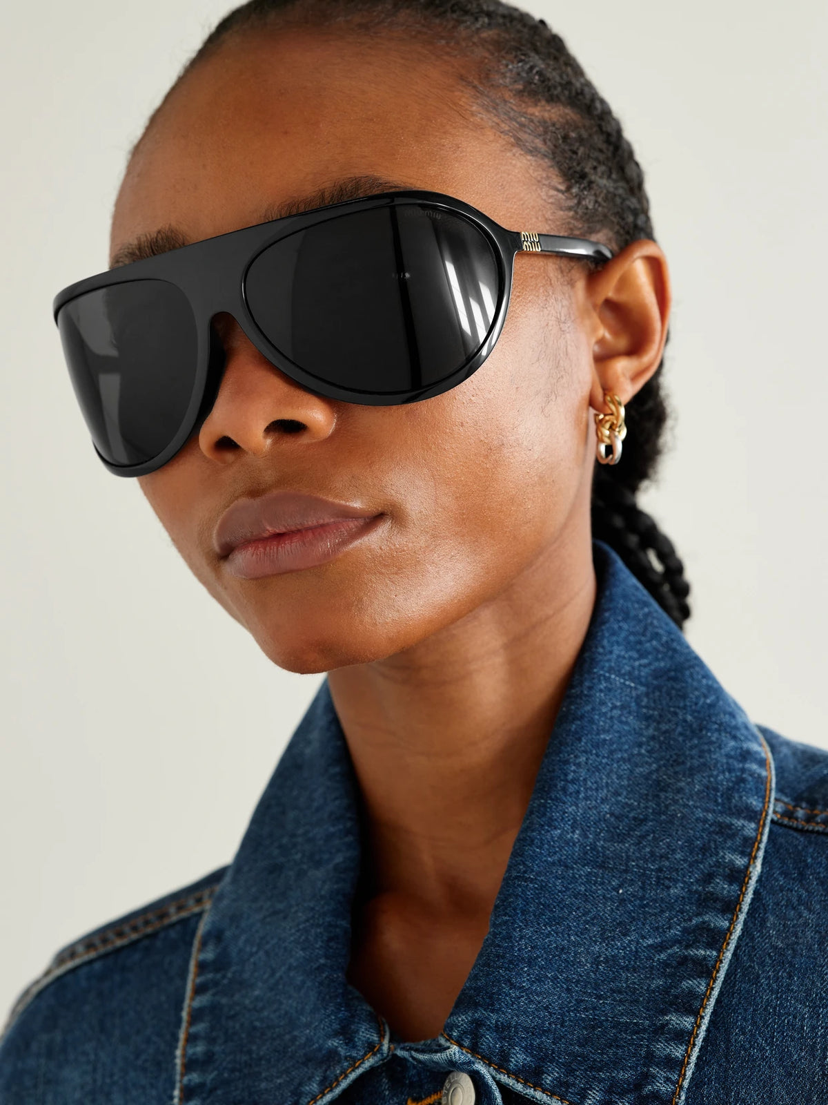 Image of Sunglasses. Product name - Oversized D-frame Acetate Sunglasses in Black colour by brand - Miu Miu Eyewear