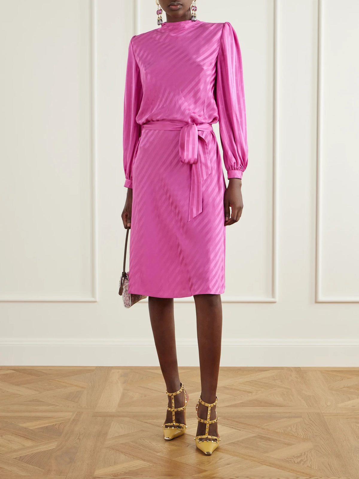 Image of Heels. Product name - Rockstud 100 Leather Pumps in Mustard colour by brand - Valentino Garavani