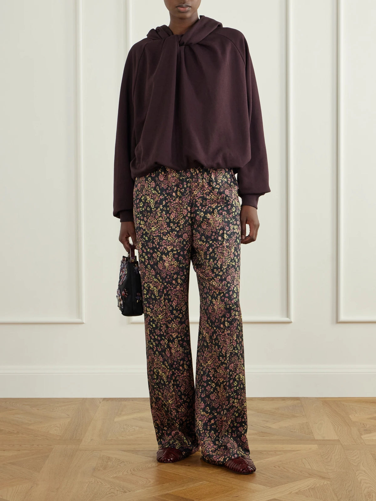 Image of a model wearing Pants. Product name - Floral-print Crepe Straight-leg Pants in Multi colour by brand - Dries Van Noten