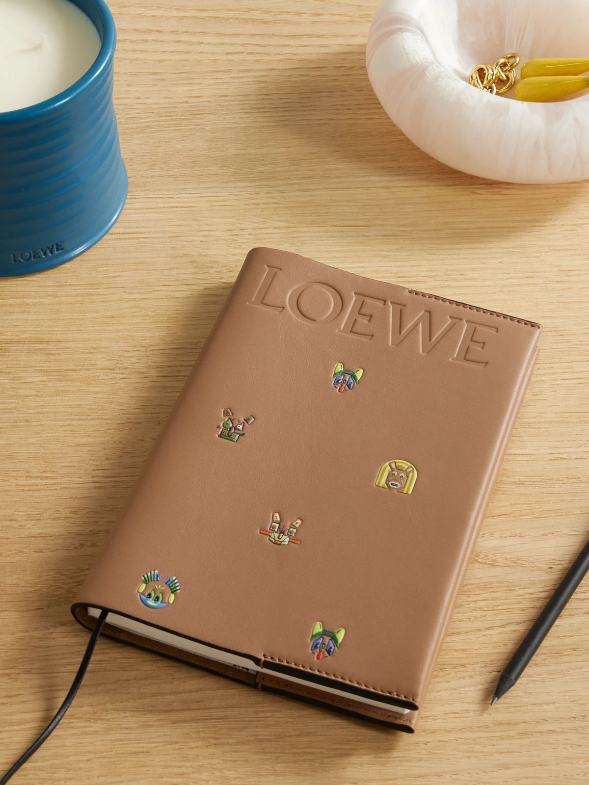 Image of Books. Product name - + Louis Wain Logo-debossed Printed Leather Notebook in Sand colour by brand - LOEWE