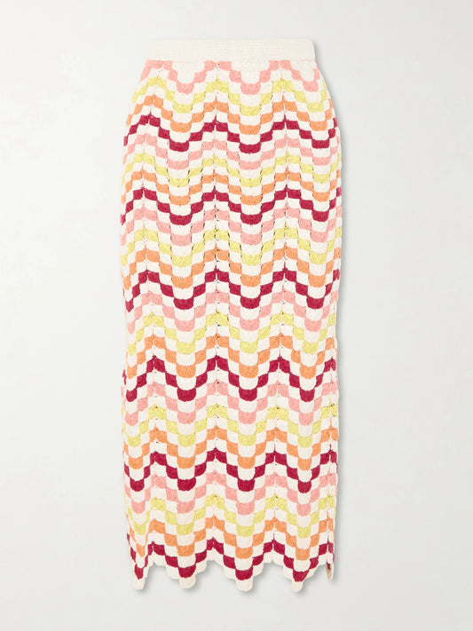 Image of a model wearing Skirts. Product name - Safi Crocheted Cotton Midi Skirt in Multi colour by brand - ESCVDO