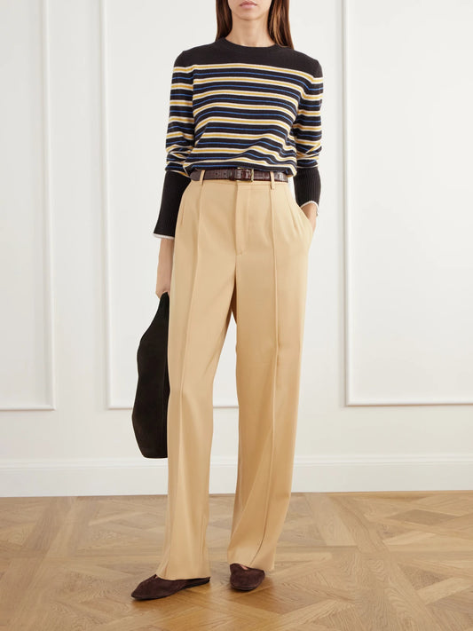 Image of a model wearing Outerwear. Product name - Lean Lines Striped Cashmere Sweater in Brown colour by brand - La Ligne