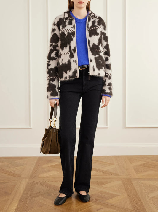 Image of a model wearing Outerwear. Product name - Cozy Crew Cashmere Sweater in Blue colour by brand - Guest In Residence