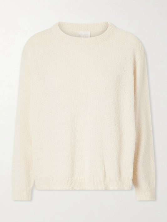 Image of a model wearing Outerwear. Product name - Kismet Knitted Cotton Sweater in Ecru colour by brand - Suzie Kondi