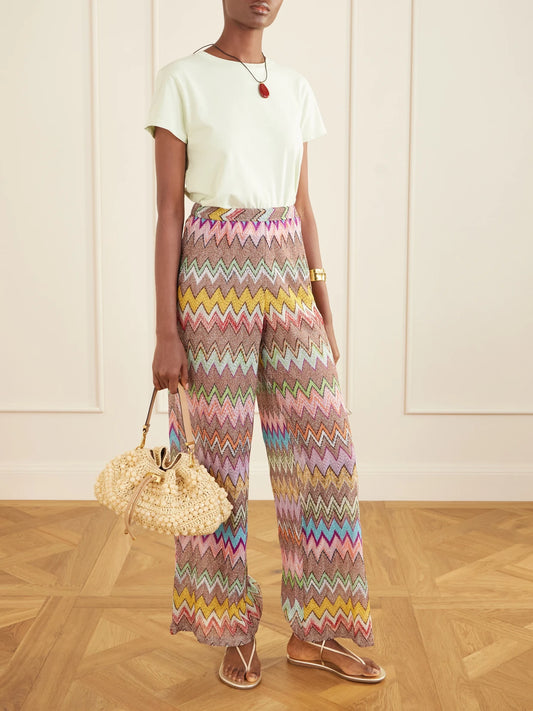 Image of a model wearing Pants. Product name - Striped Metallic Crochet-knit Wide-leg Pants in Multi colour by brand - Missoni