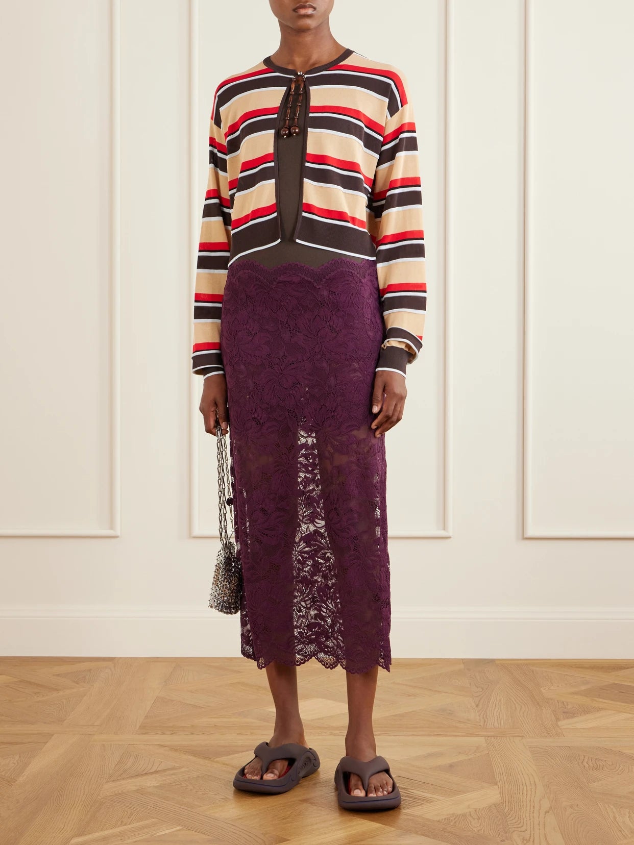 Image of a model wearing Outerwear. Product name - Bead-embellished Striped Knitted Cardigan in Multi colour by brand - RABANNE