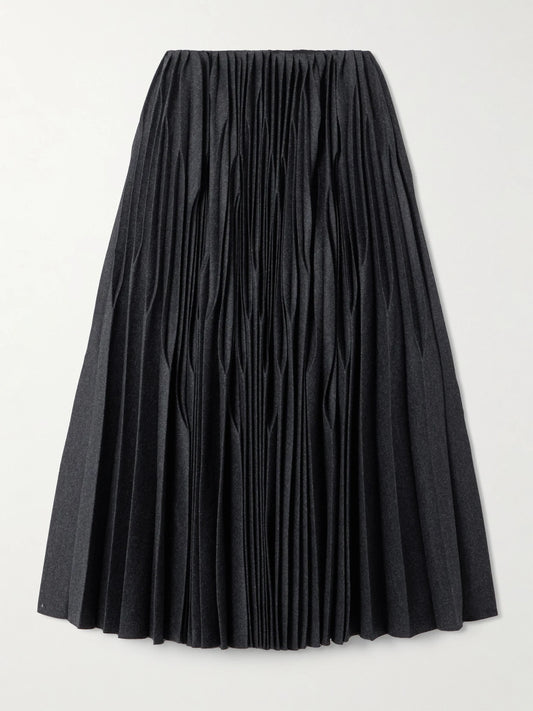Image of a model wearing Skirts. Product name - Pleated Wool Midi Skirt in Dark gray colour by brand - Alaïa