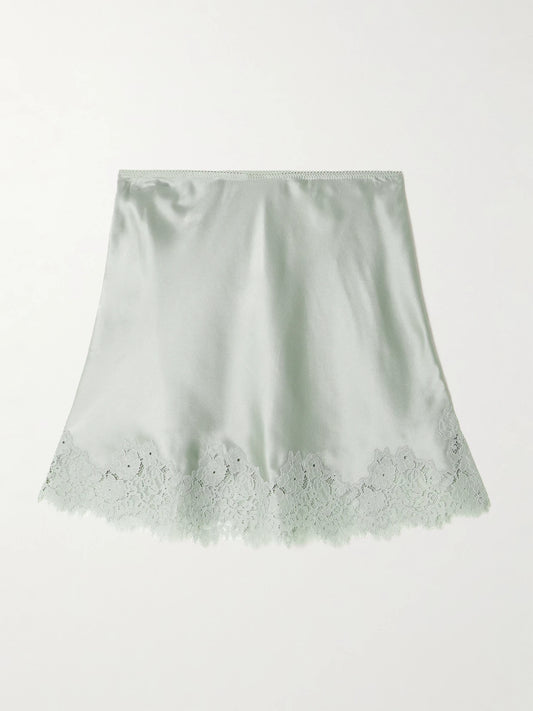 Image of a model wearing Skirts. Product name - Giuliette Lace-trimmed Floral-print Silk-charmeuse Skirt in Gray colour by brand - DÔEN