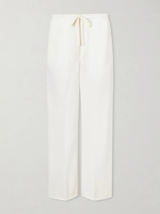 Image of a model wearing Pants. Product name - Aurora Cotton And Linen-blend Wide-leg Pants in White colour by brand - Citizens of Humanity