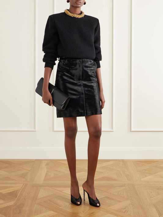 Image of a model wearing Outerwear. Product name - Embellished Ribbed Wool And Cashmere-blend Sweater in Black colour by brand - Balmain
