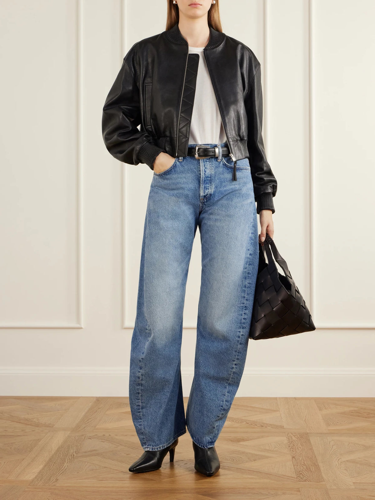 Image of Jeans. Product name - Spiral Mid-rise Barrel-leg Jeans in Mid denim, Black colour by brand - AGOLDE
