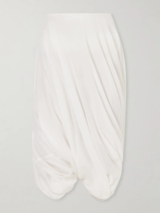 Image of a model wearing Skirts. Product name - Cocoon Pleated Lyocell And Cotton-blend Maxi Skirt in White colour by brand - TOTEME