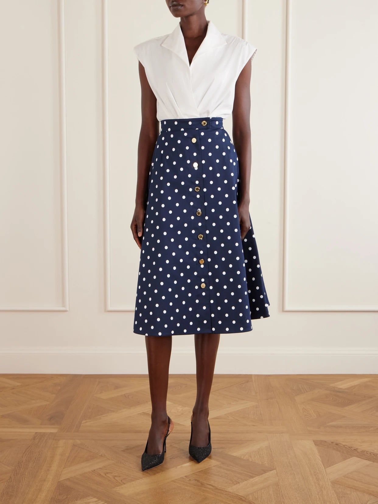 Image of a model wearing Tops. Product name - Wrap Cotton-blend Shirt in White colour by brand - Carolina Herrera