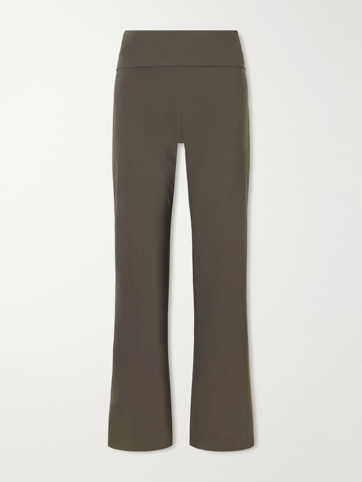 Image of a model wearing Pants. Product name - Studio Twill Skinny-leg Pants in Green colour by brand - ST. AGNI
