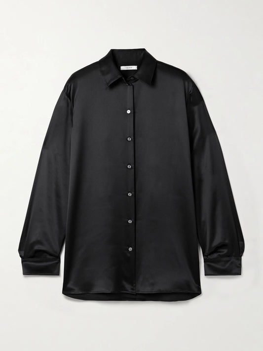 Image of a model wearing Tops. Product name - Sisilia Oversized Silk-satin Shirt in Black colour by brand - The Row