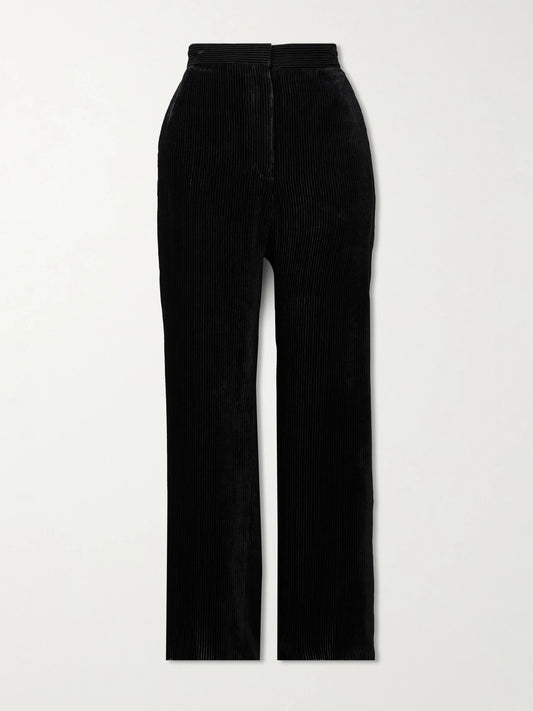Image of a model wearing Pants. Product name - Anker Ribbed Velvet Straight-leg Pants in Black colour by brand - The Row