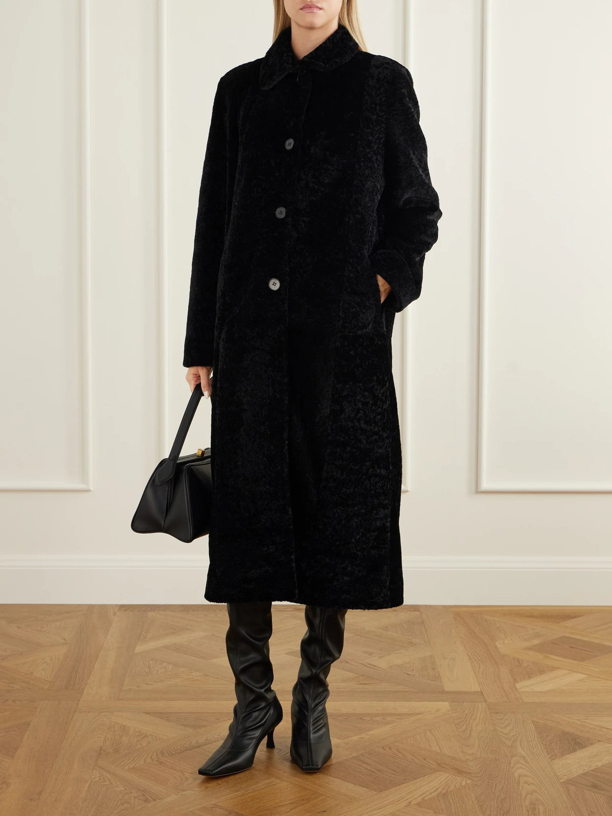 Image of Coats & Jackets. Product name - Paloma Shearling Coat in Black colour by brand - Nour Hammour