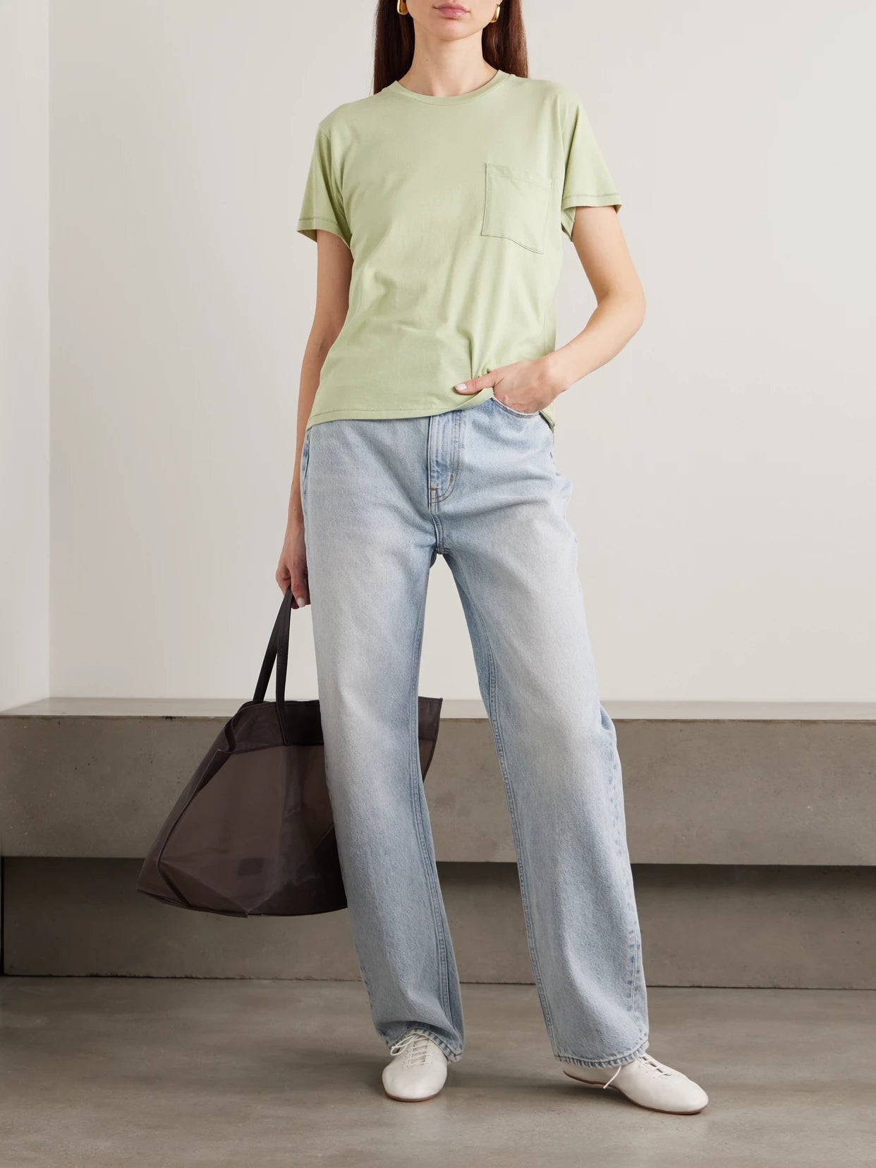 Image of a model wearing Tops. Product name - The Pocket Tee Cotton And Modal-blend Jersey T-shirt in Green colour by brand - Jamie Haller