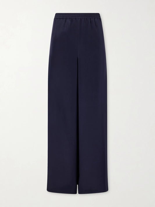 Image of a model wearing Pants. Product name - Logo-embroidered Silk Wide-leg Pants in Navy colour by brand - Max Mara