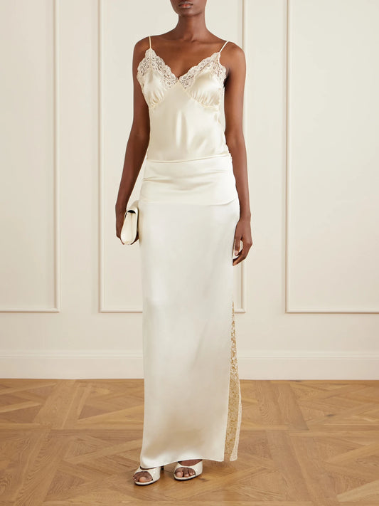 Image of a model wearing Skirts. Product name - Lace-trimmed Silk-satin Maxi Skirt in Sand colour by brand - Colleen Allen
