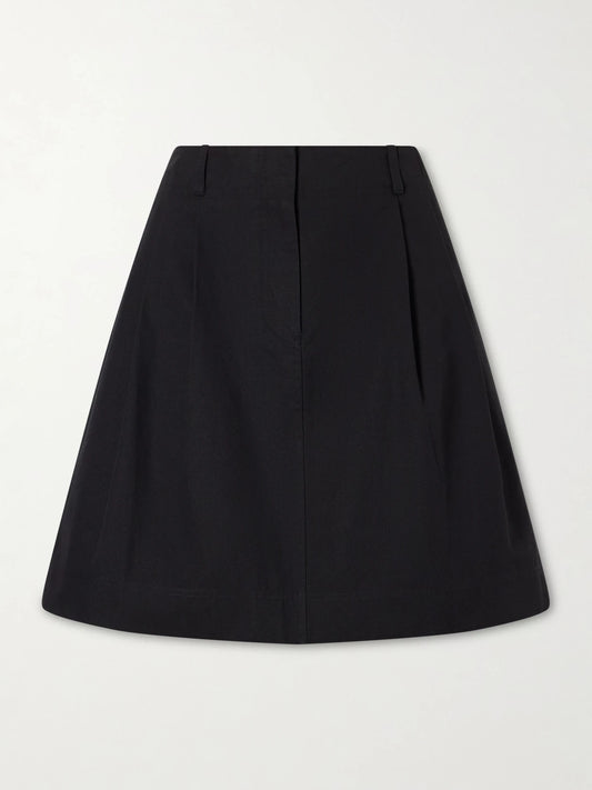 Image of a model wearing Skirts. Product name - Cotton And Lyocell-blend Mini Skirt in Black colour by brand - TOTEME