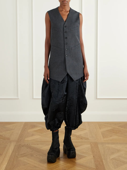 Image of a model wearing Pants. Product name - Gathered Cropped Satin-jacquard Wide-leg Pants in Black colour by brand - Comme des Garçons Comme des Garçons