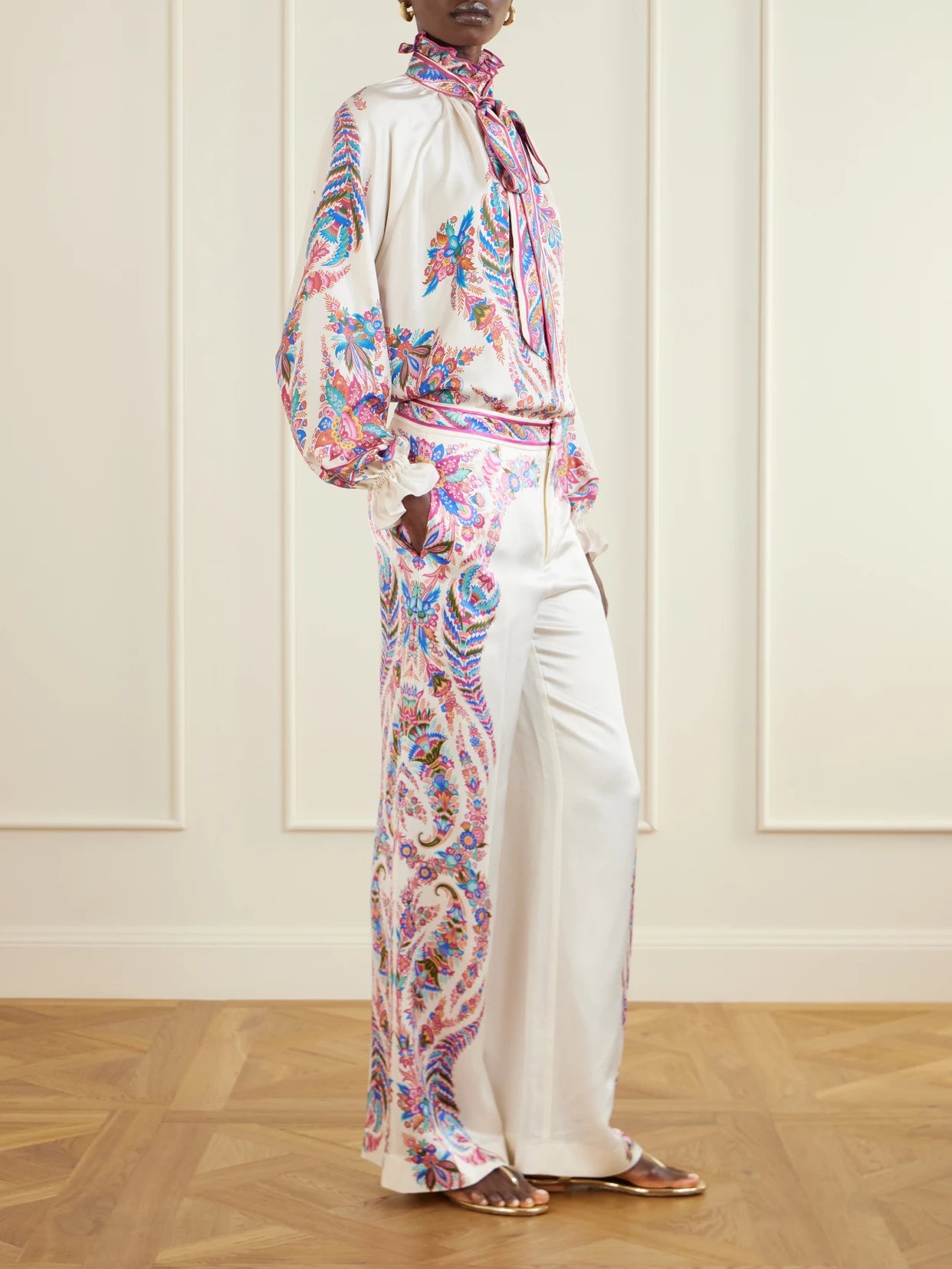 Image of a model wearing Pants. Product name - Floral-print Crepe Wide-leg Pants in Multi colour by brand - Etro