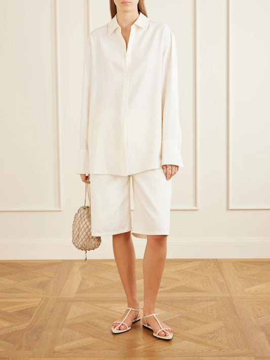 Image of a model wearing Tops. Product name - Mollie Sequin-embellished Striped Twill Shirt in Off-white colour by brand - KALLMEYER