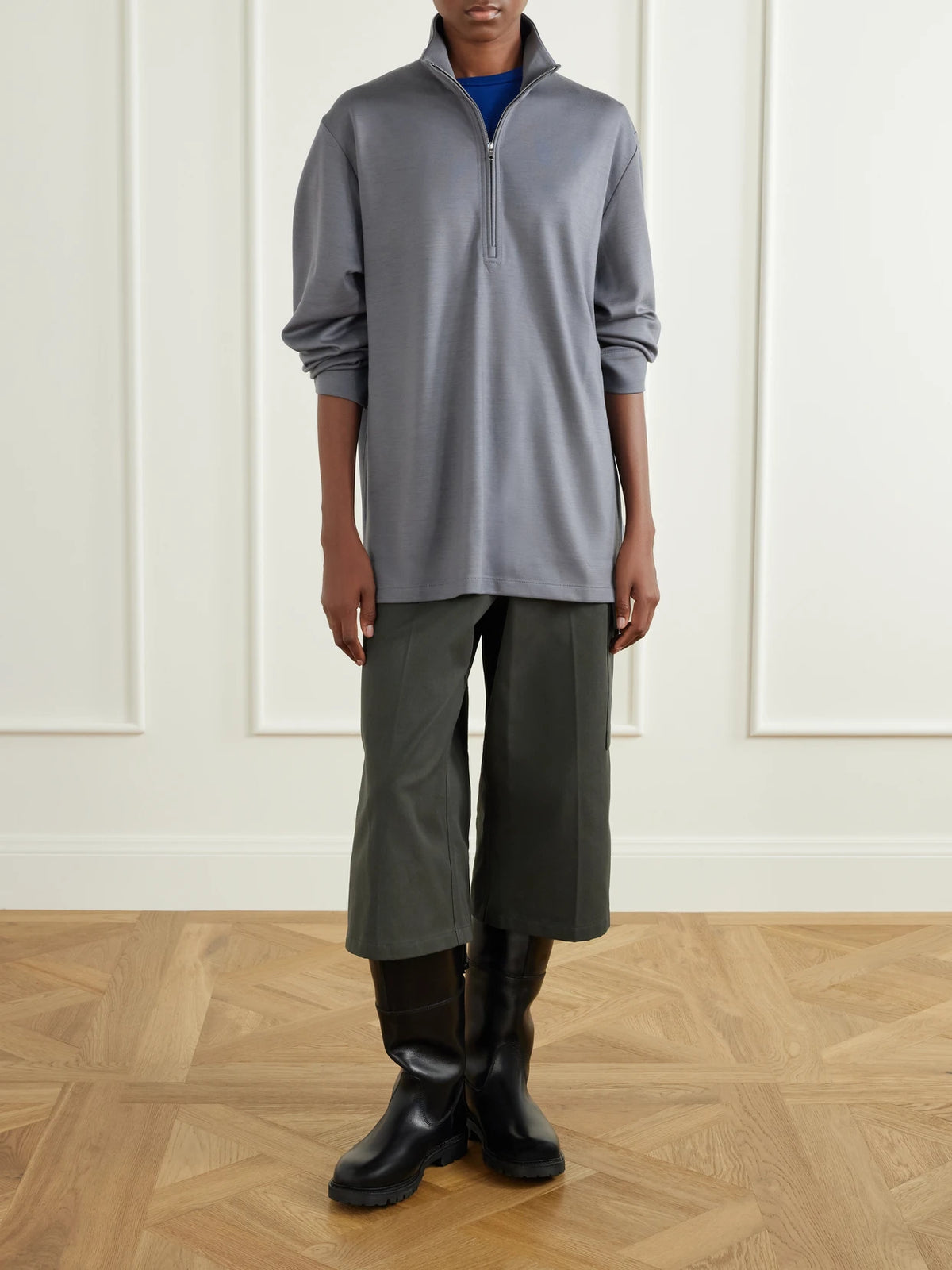 Image of a model wearing Shorts. Product name - Garment-dyed Cotton-twill Shorts in Army green colour by brand - RIER