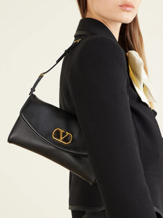 Image of Bags. Product name - Devain Leather Shoulder Bag in Black colour by brand - Valentino Garavani