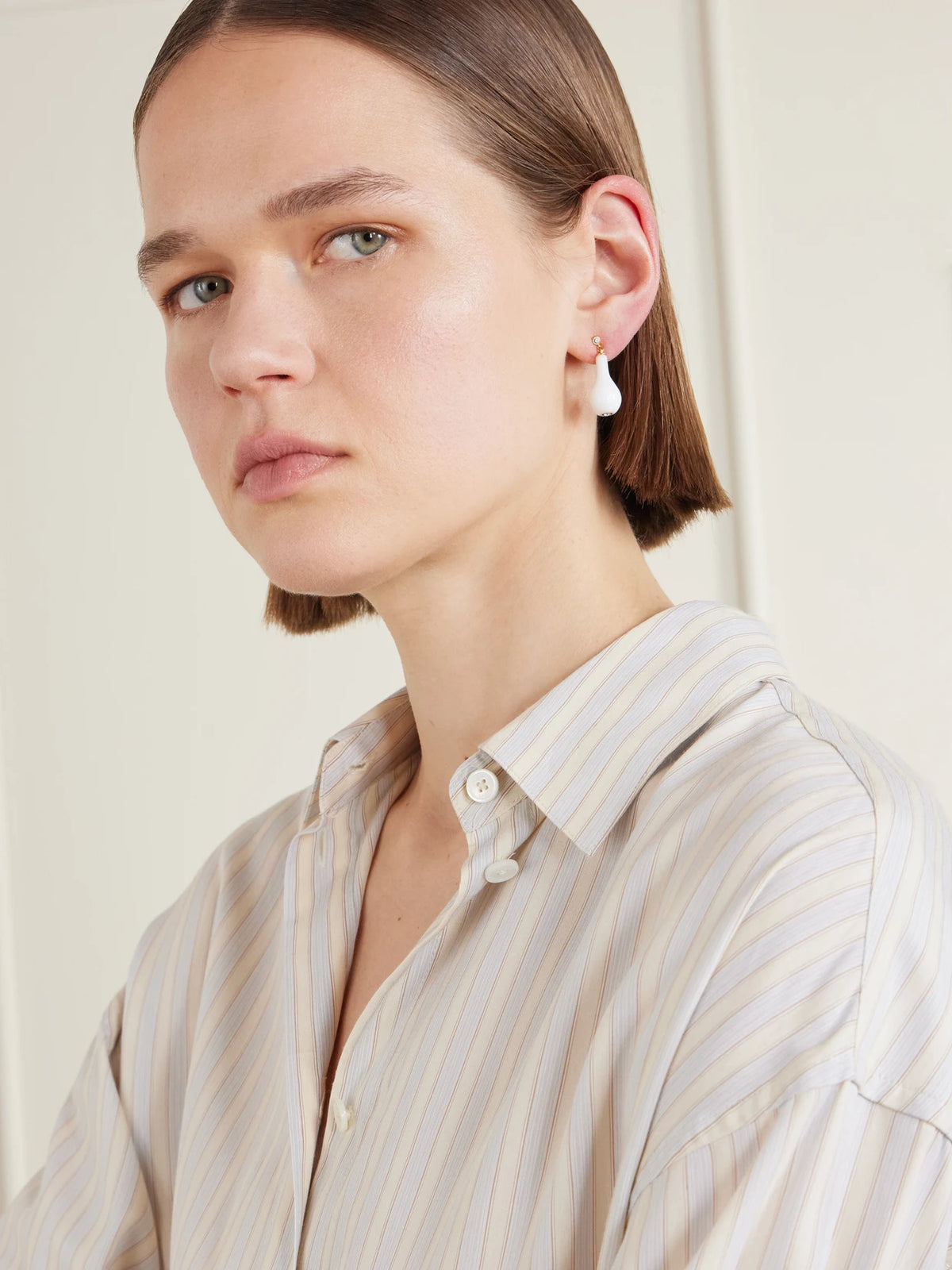 Image of Earrings. Product name - Drop Crystal-embellished Gold-plated Earrings in White colour by brand - TOTEME