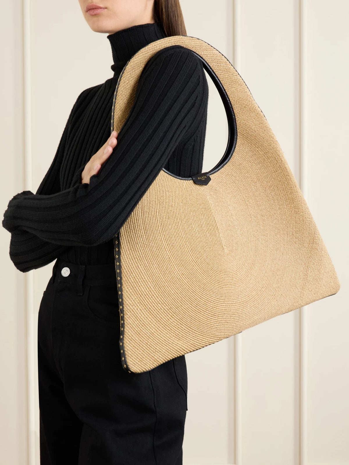Image of Bags. Product name - Leather-trimmed Paper Straw Shoulder Bag in Camel colour by brand - Alaïa